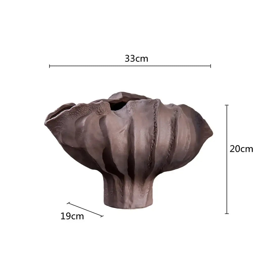 Matte brown organic black ceramic wavy flower vase with fluted top and textured ridges for living room decorbites ceramic wavy decor