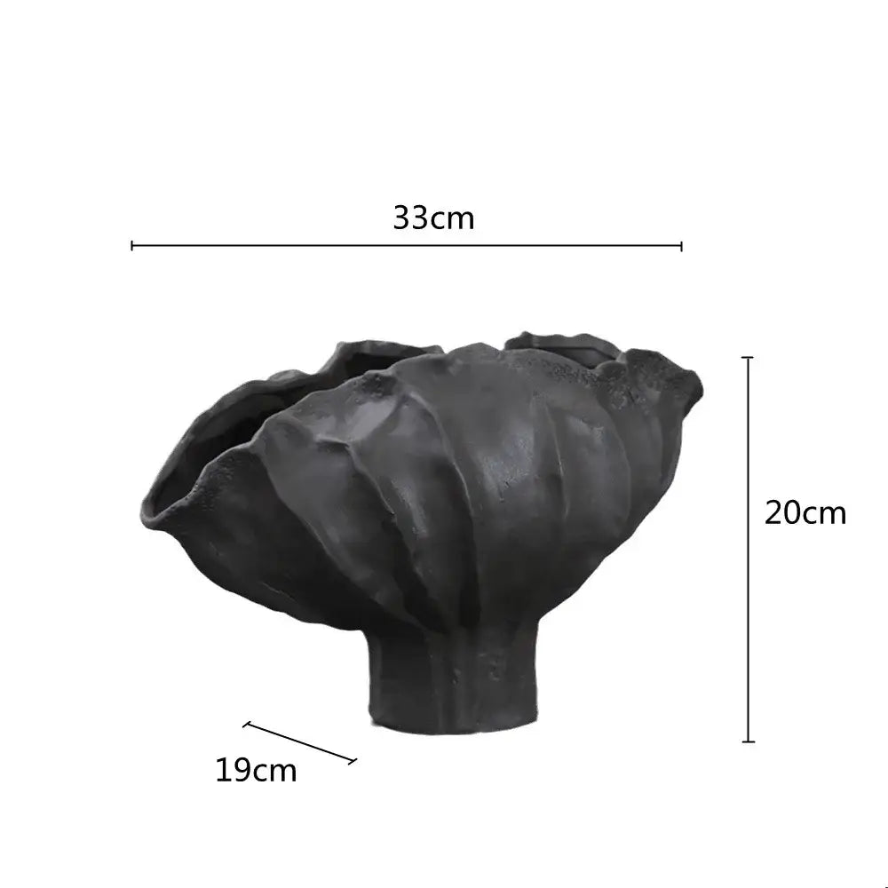 Organic black ceramic wavy flower vase with layered petals and short stem for living room decor by decorbites ceramic wavy