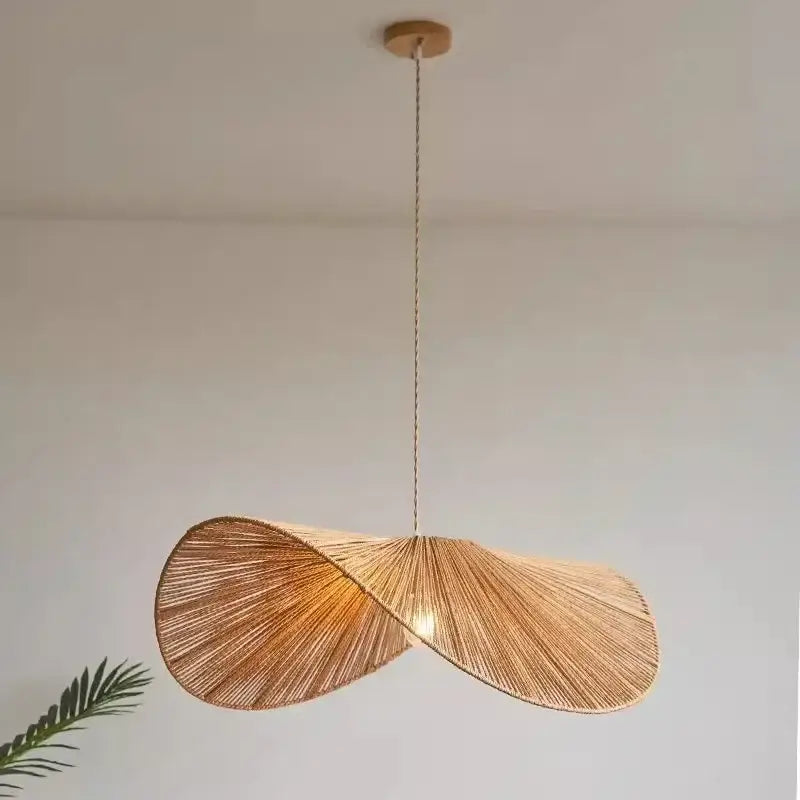 Organic golden brown handmade rattan led pendant light with twisted fan design and wooden ceiling mount for dining room decorbites pendant lights