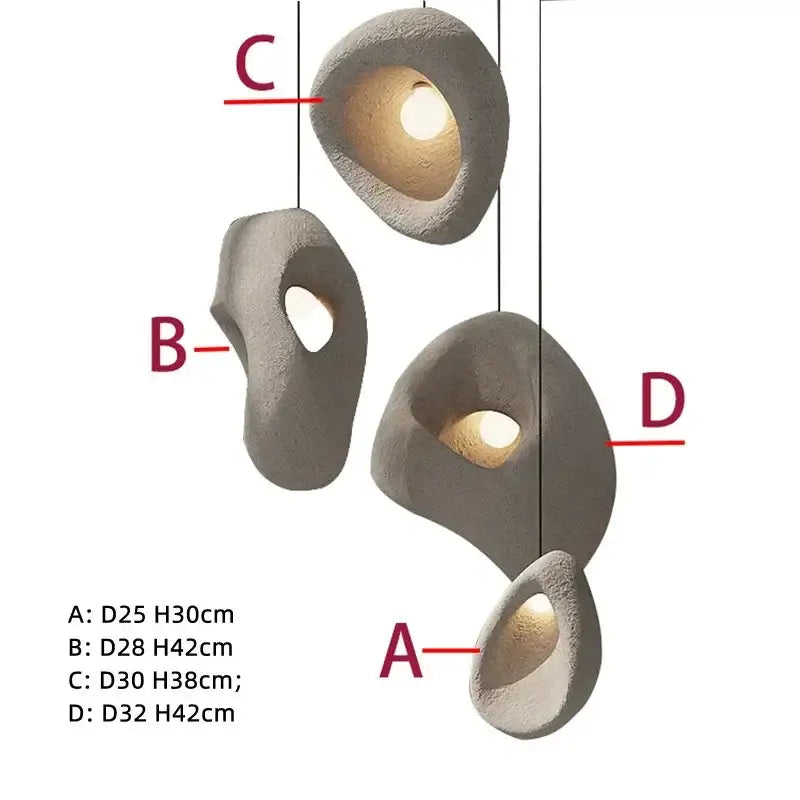 Organic gray textured stone pendant lights with warm interior lighting for dining room decorbites designer led pendant