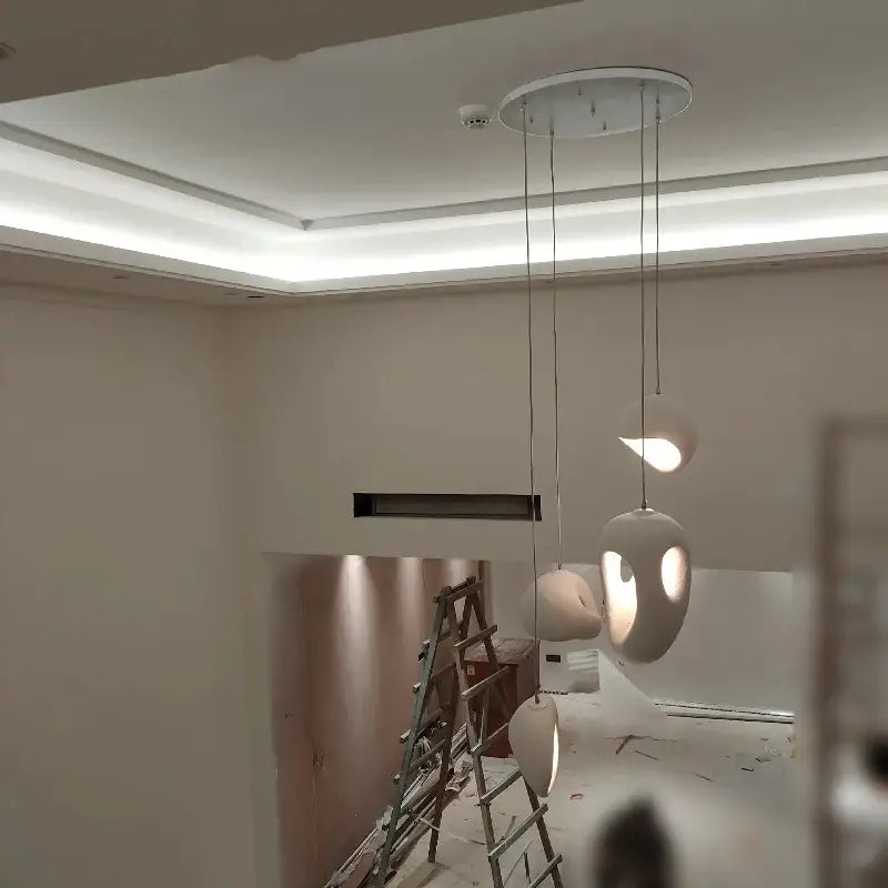 Modern white ceramic pendant lights with sleek organic shapes for dining room decorbites designer led pendant lighting