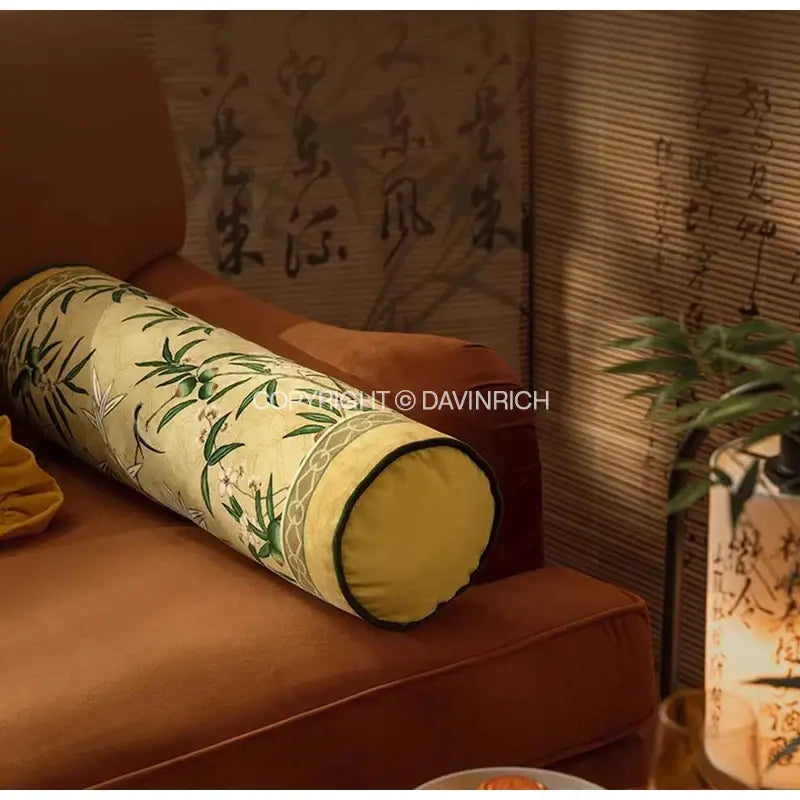Cylindrical oriental beige autum orchid velvet lumbar pillow cover with cream fabric green bamboo white floral embroidery and yellow border