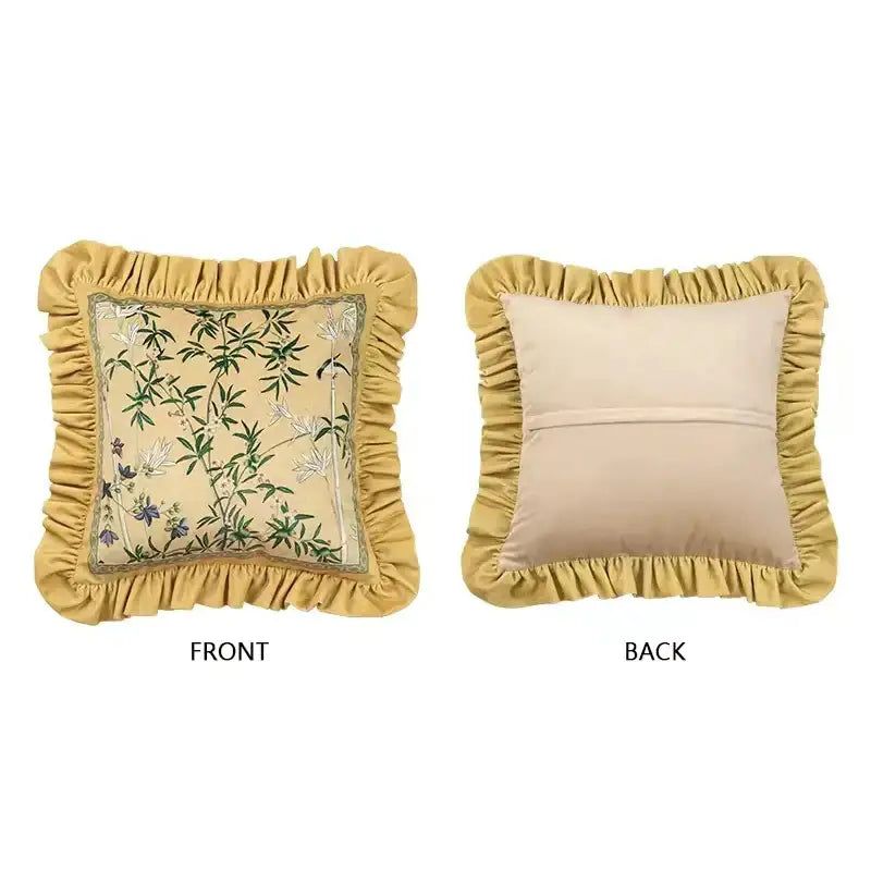 A mustard-yellow autum orchid velvet pillow cover with ruffled edges and botanical embroidery for bedroom decor