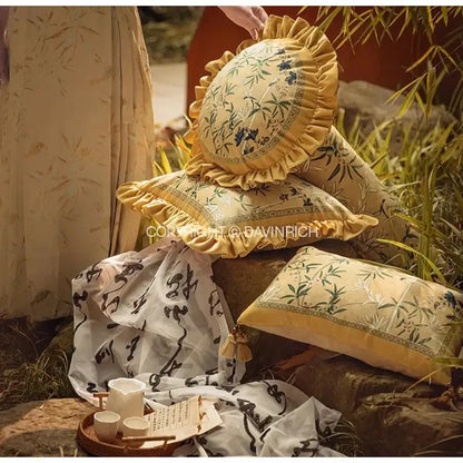 Yellow pillow cover with ruffled edges and embroidered bamboo pattern in autum orchid velvet lumbar style