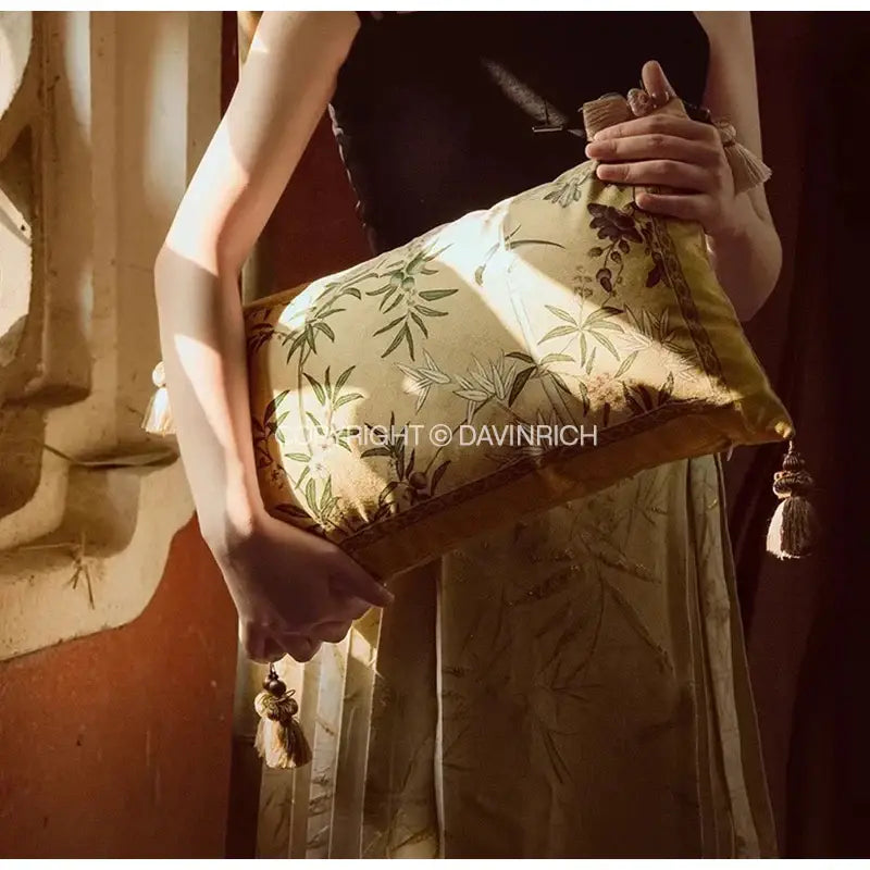 Oriental beige autum orchid velvet lumbar pillow cover in golden yellow with green bamboo leaf embroidery and tassels