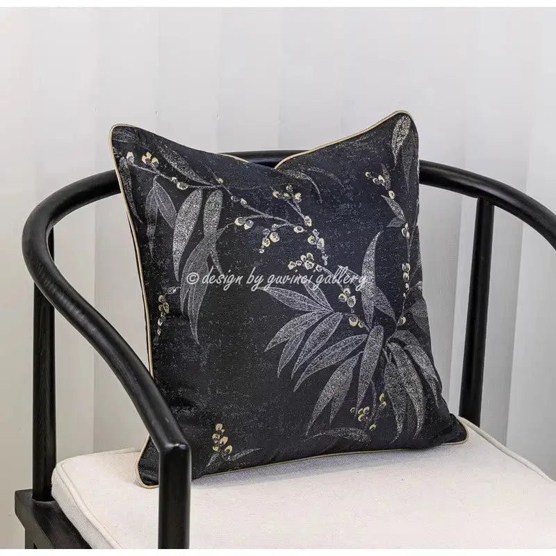 Black cushion pillow cover with gold floral jacquard oriental art featuring silver leaf and berry embroidery with gold trim