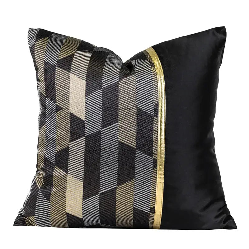Black satin pillow cover with geometric pattern in black gray and gold tones and vertical gold trim for oriental art decor