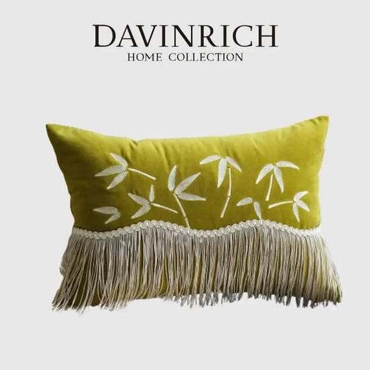 Olive green velvet pillow cover with white decorbites bamboo embroidered design and bamboo embroidered fringed trim