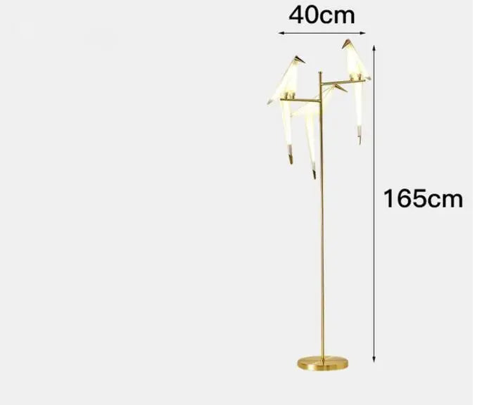 Gold-colored metal floor lamp with three stylized bird design led light fixtures for dining room decorbites bird design
