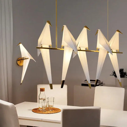 Elegant white origami crane bird design led pendant light with gold-toned metal accents for dining room decorbites bird design