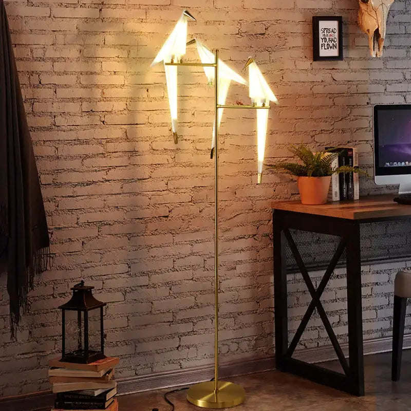 Gold-colored decorbites bird led floor lamp with three illuminated origami bird shades for living room decor