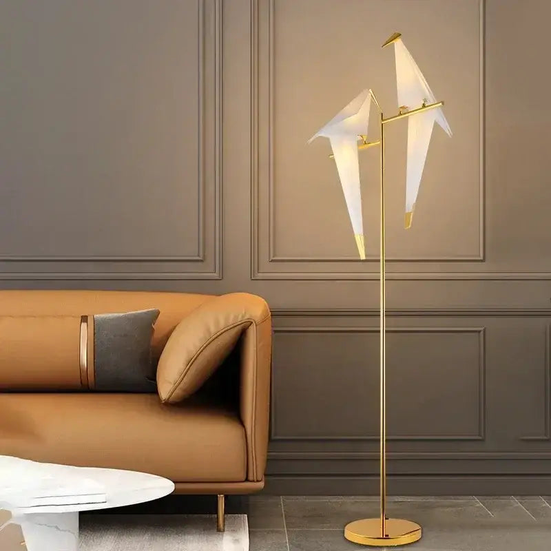 Gold-toned floor lamp with two white origami crane-shaped led lights decorbites bird led floor lamp for living room decor