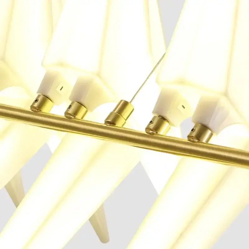 Modern chandelier with cream acrylic geometric fixtures on polished brass frame for bedroom decorbites crane chandelier iron led