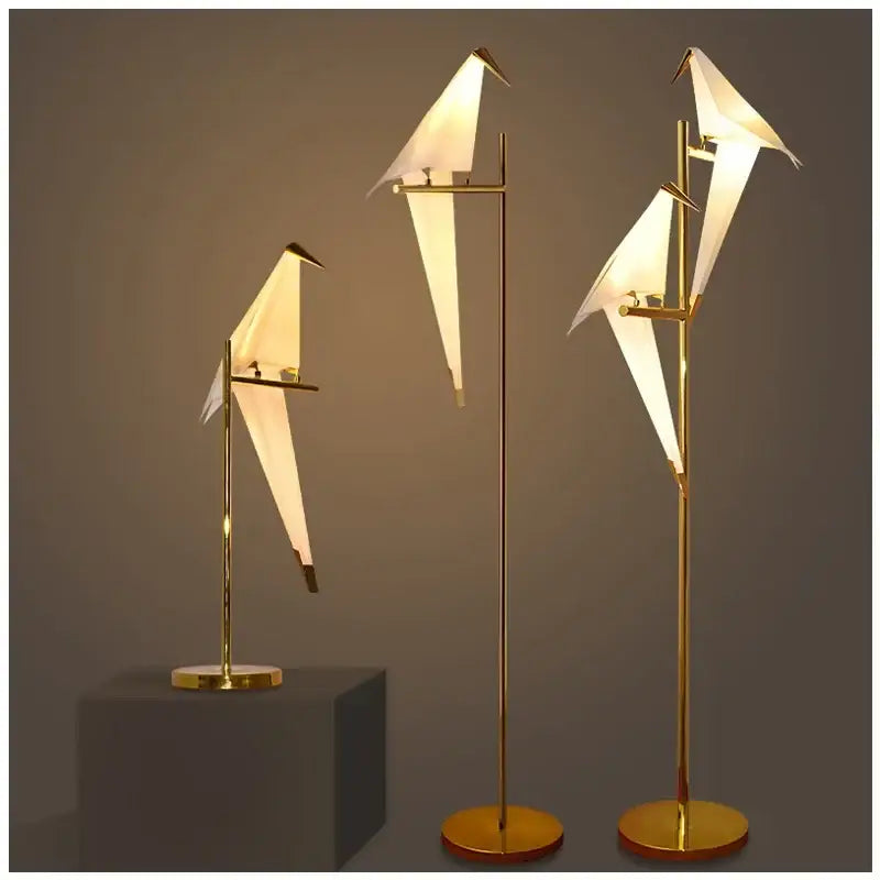 Gold-finished origami bird floor lamps with illuminated white paper wings for bedroom decorbites crane chandelier iron led