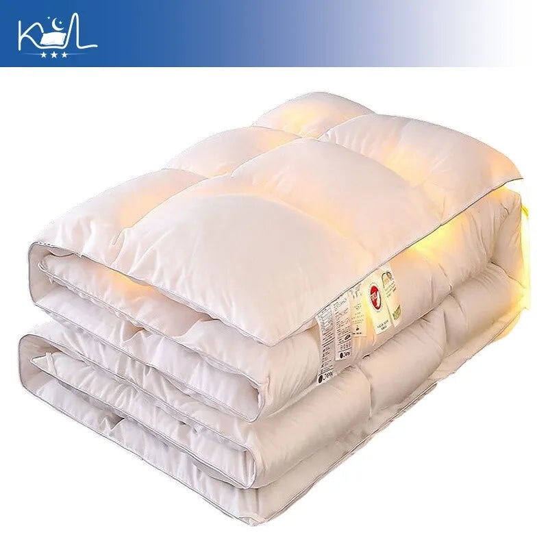 White quilted down comforter with plush texture and sheen made of 95% white goose down for warm spring autumn winter use