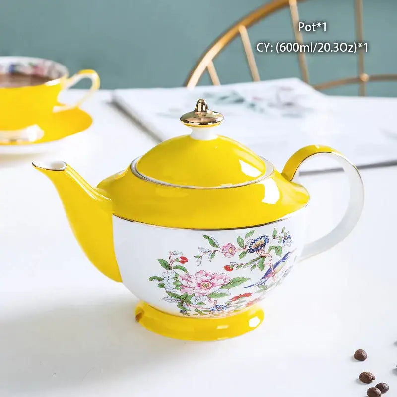 Bright yellow decorbites bone china tea pot with white body floral bird patterns and gold trim for elegant dining room decor