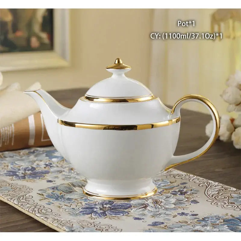 White porcelain bone china tea pot with elegant gold trim from decorbites ornate 18th century dining room collection
