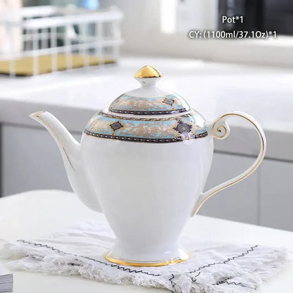 Ornate 18th century bone china tea pot with gold trim and blue black floral patterns by decorbites bone china