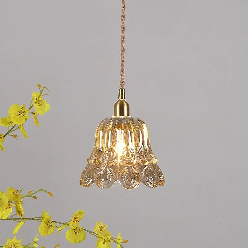 Ornate amber copper led pendant light with translucent fluted glass and brass accents for café and dining room use
