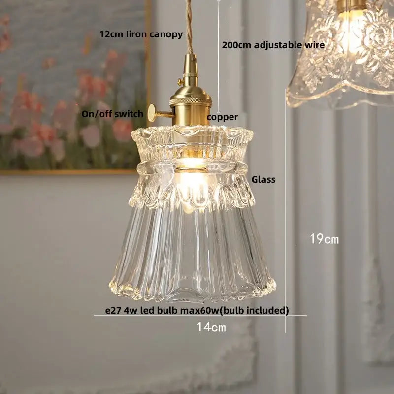Clear glass pendant light with brass-finished copper switch and iron canopy for ornate amber copper led pendant use