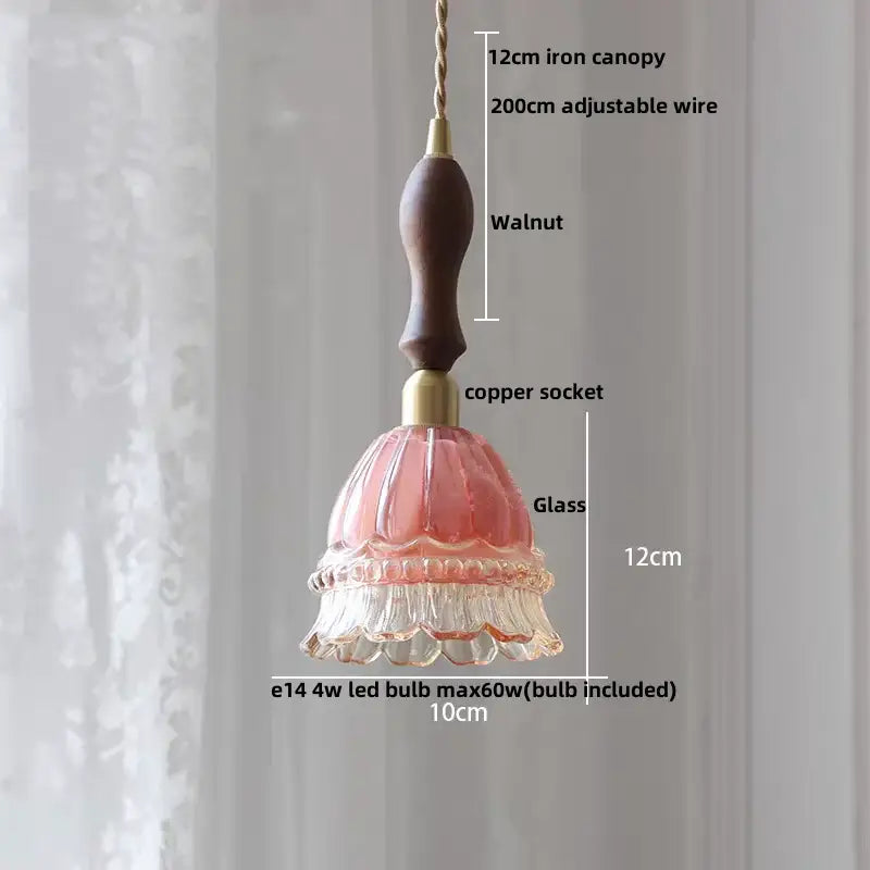 Pink glass pendant light featuring a walnut-finished iron canopy and copper socket for café and dining rooms amber copper led design