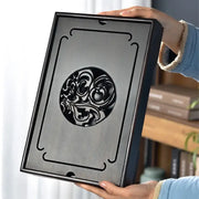 Ornate black bamboo tea tray with circular cutout and decorative curved lines for dining room drainage use