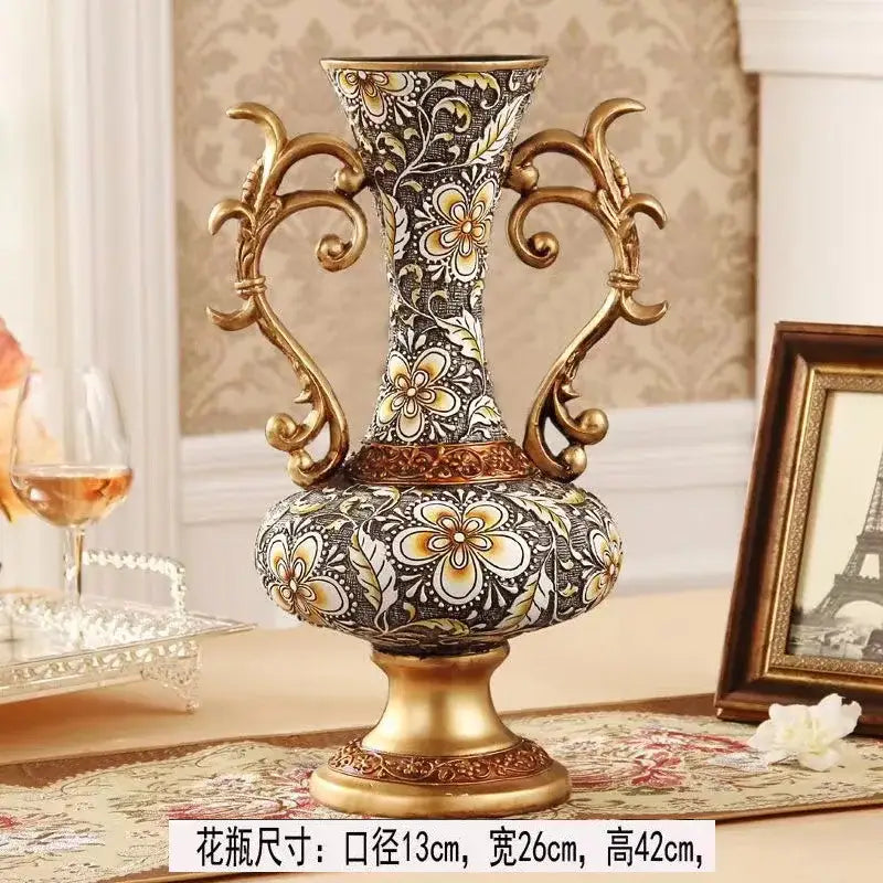 Ornate black and gold resin vase dried flowers with intricate handles featuring vintage european floral design for decor
