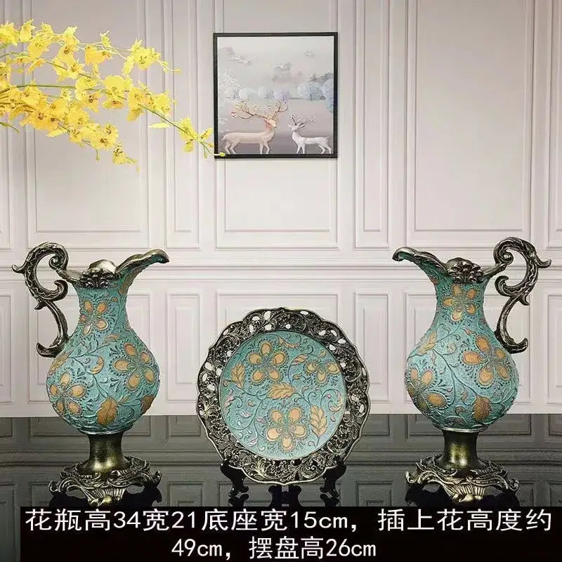 Antique-style turquoise and gold ceramic resin vase dried with ornate black metal handles and floral patterns for living room decor