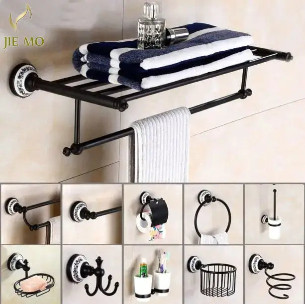 Ornate black wrought iron towel rack with white patterned circular mounting plate in bathroom accessories set