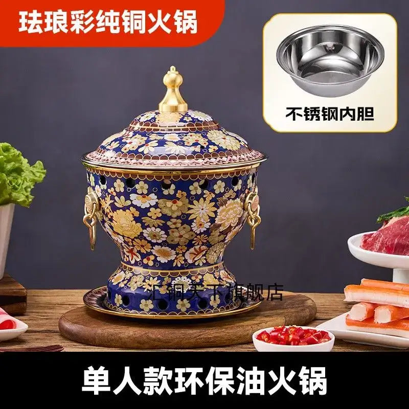 Ornate blue and white enamel copper hot pot with floral patterns brass handles and golden lid finial for kitchen cookware
