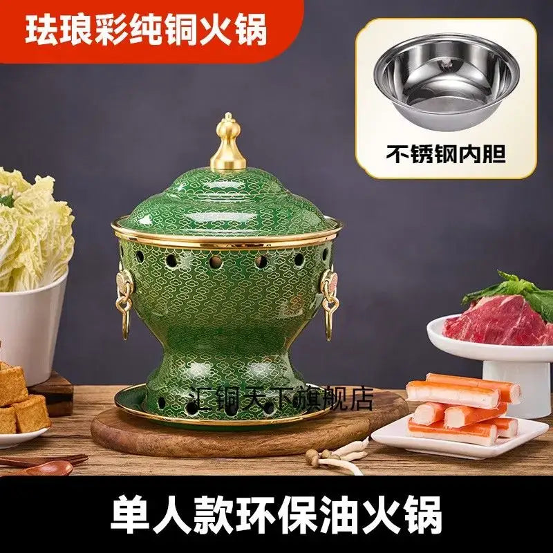 Ornate blue and white enamel copper hot pot with green enamel copper body gold trim and decorative side perforations