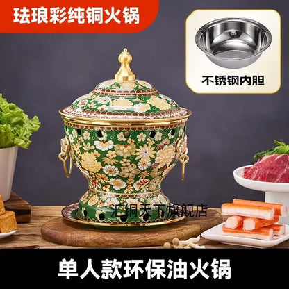 Ornate blue and white enamel copper hot pot with green enamel copper body, gold floral patterns, and stainless steel liner