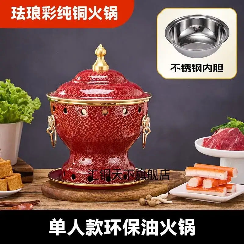 Ornate red enamel copper hot pot with gold accents and stainless steel inner bowl for kitchen cookware use