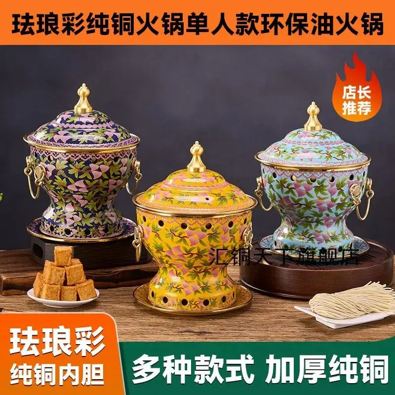 Three ornate blue and white enamel copper hot pots with gold-trimmed lids and handles for kitchen cookware use