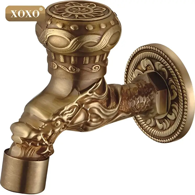 Antique brass-finished decorbites dragon style faucet tap with intricate dragon and floral embossing by xoxo for bathroom mount