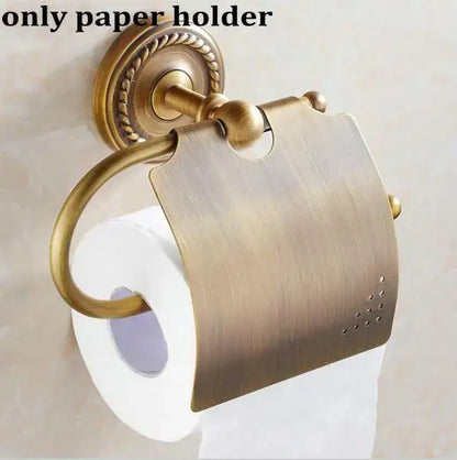 Antique brass-finished wall-mounted toilet paper holder with ornate rope-twist detailing in decorbites copper bathroom set