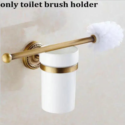 White ceramic toilet brush holder with ornate brass finished copper bracket and handle from decorbites copper bathroom accessories set