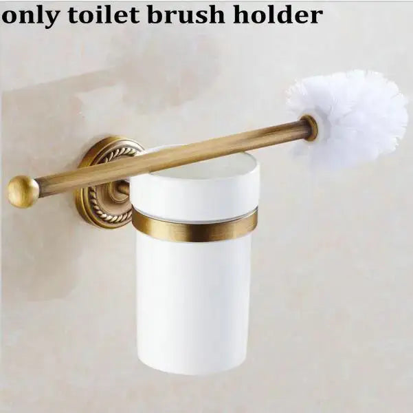 White ceramic toilet brush holder with ornate brass finished copper bracket and handle from decorbites copper bathroom accessories set