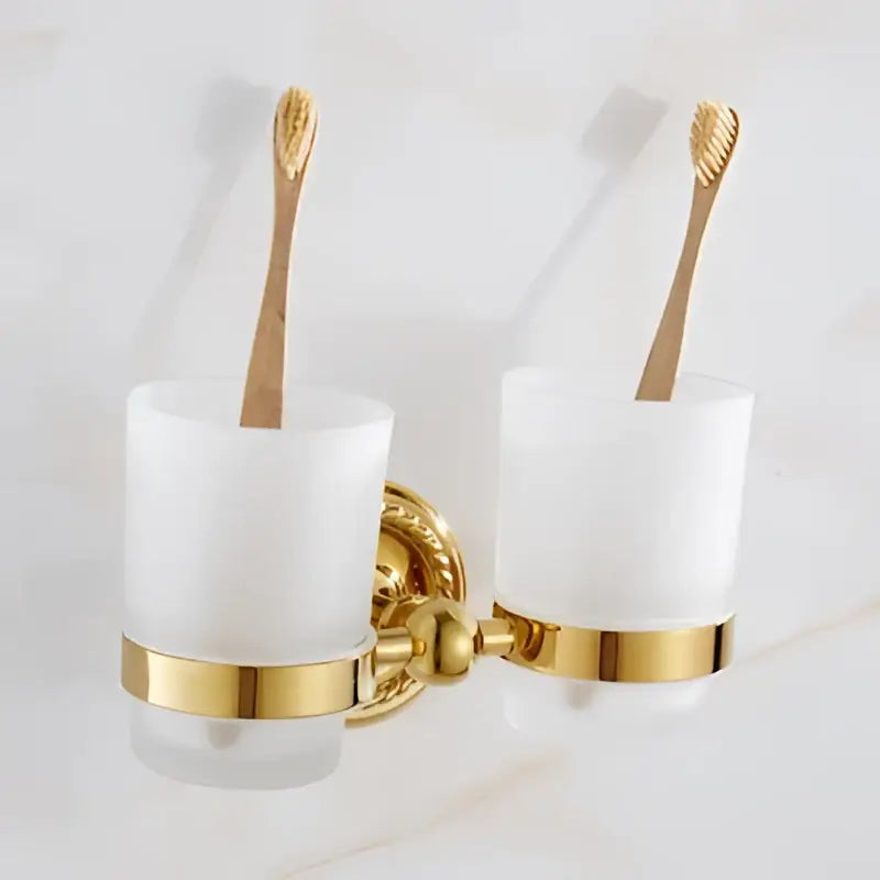 Gold-finished double toothbrush holder with frosted glass cups in ornate decorbites brass gold bathroom hardware set