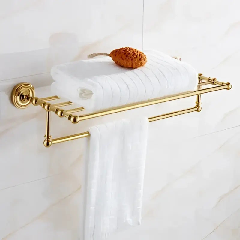 Ornate brass gold bathroom hardware towel rack with double-bar design and decorative ends by decorbites brass gold