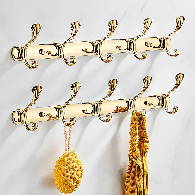 Ornate brass gold towel hook rack with five decorative hooks on two parallel bars for bathroom and kitchen decorbites brass gold