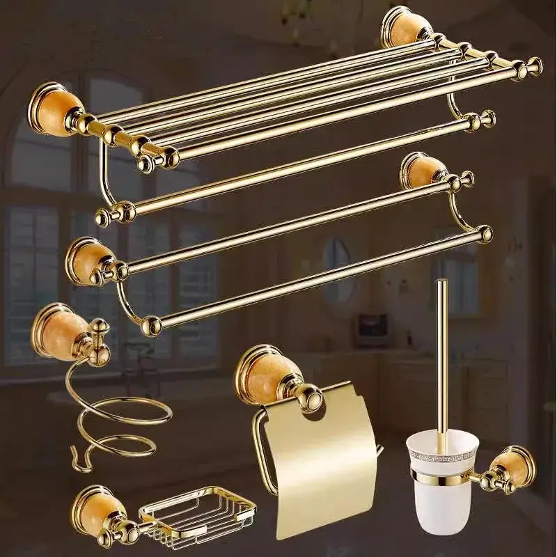 Gold-toned brass jade bathroom towel rack set with ceramic end caps and amber accents from decorbites brass jade collection