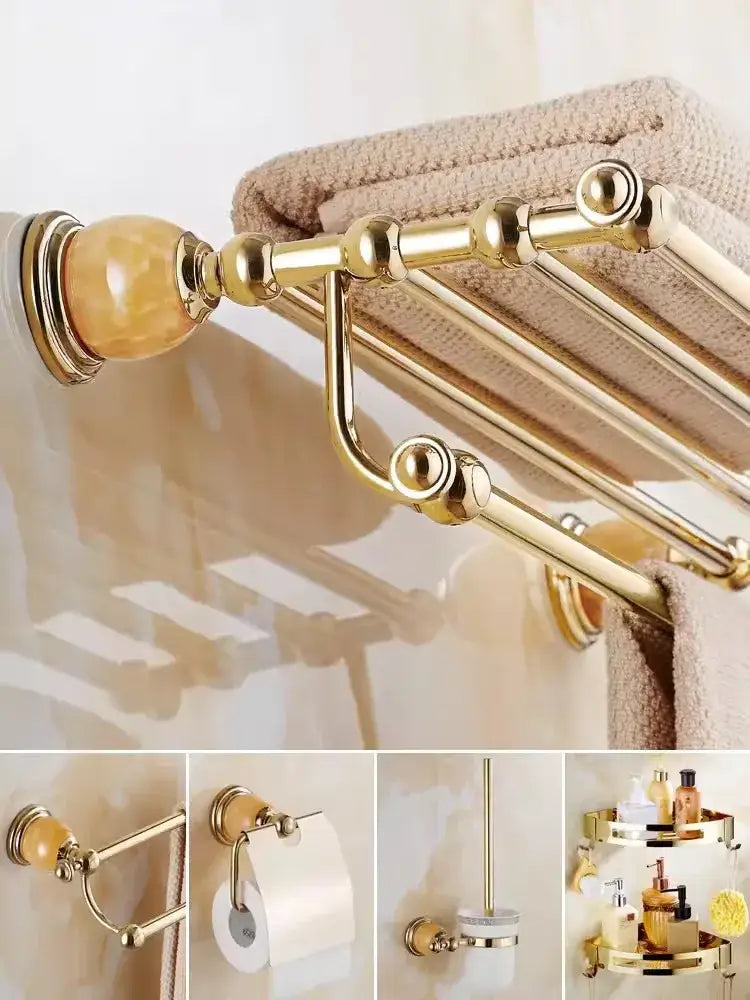 Gold-finished bathroom towel rack with polished brass finish and amber ceramic finial from decorbites brass jade bathroom set