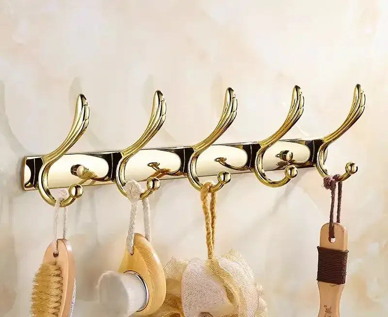 Gold-toned brass jade wall-mounted hook set with elegant curved antler design for brass jade bathroom decorbites