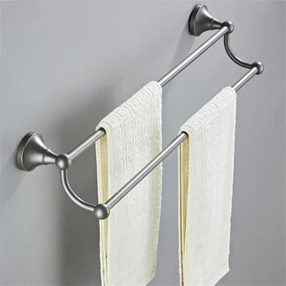 Stainless steel double towel rack with brushed finish and decorative spheres in a decorbites gray bathroom set