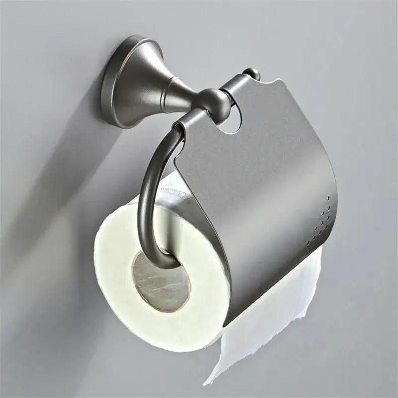 Brushed nickel toilet paper holder with sleek modern design and perforated cover in decorbites gray bathroom accessories set