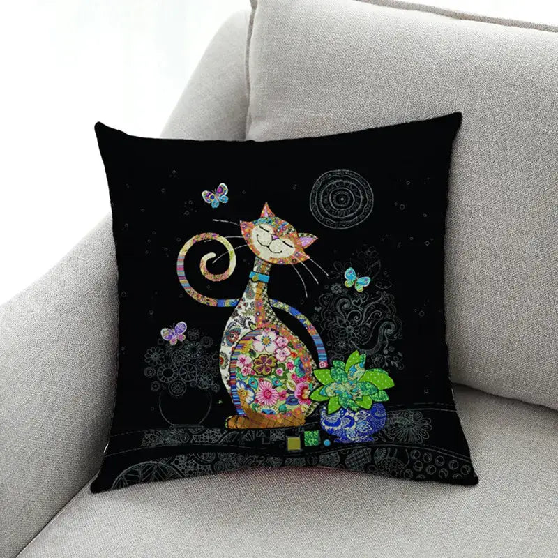 Black cushion with colorful patchwork cat featuring floral patterns and butterflies in decorbites cat design linen pillowcase