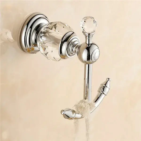 Ornate chrome finished robe hook with crystal accents and curved design from decorbites crystal brass gold collection