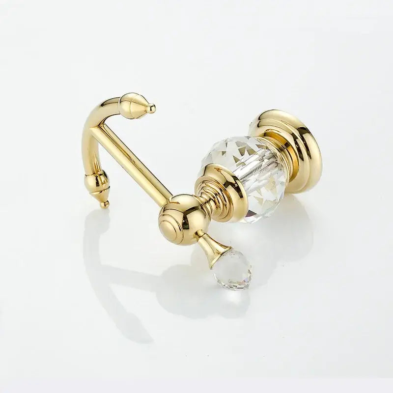 Ornate crystal brass gold bathroom towel rack with gold finish, faceted crystal knob, and matching finials by decorbites robe hook