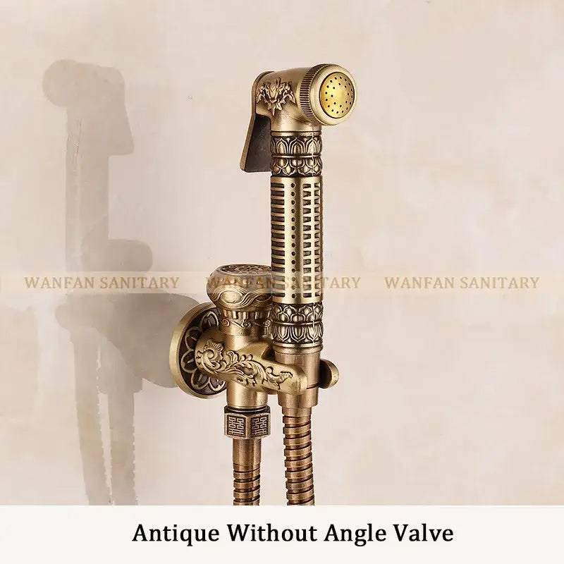 Ornate engraved gold brass wall mounted bidet faucet with antique brass finish and floral geometric embossing decorbites brass wall